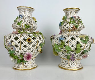 APAIR OF RETICULATED FLOWER ENCRUSTED MEISSEN VASES