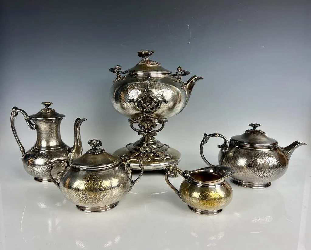 ANTIQUE CHRISTOFEL TEA SET: Comprising of 5 pieces, water warmer, tea pot, creamer , sugar pot. Estimate $2.500-3.000