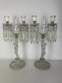 A PAIR OF BACCARAT ENFANT CANDELABRA