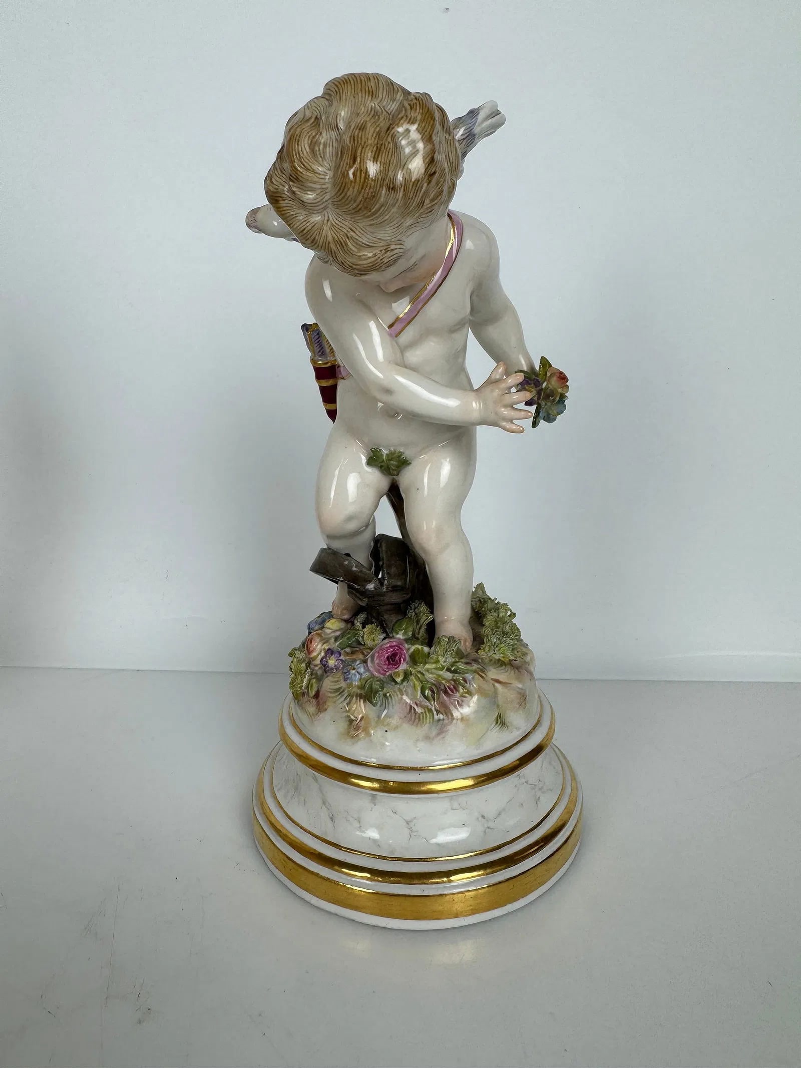 MEISSEN CHERUB L SERIES: Circa 1900. First quality mark. Measures 8 inches h. In excellent condition. Estimate $1000-1200