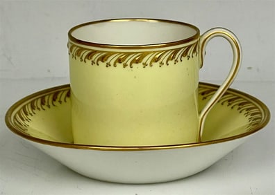 BERLIN KPM YELLOW GROUND DEMITASSE CUP AND SAUCER