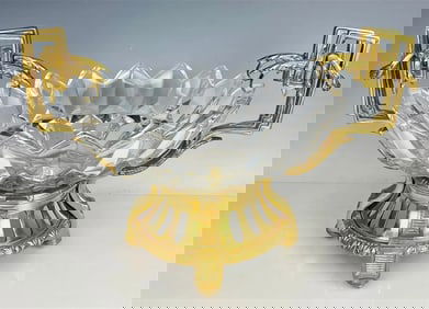 A LARGE ORMOLU AND CUT CRYSTAL CENTERPIECE