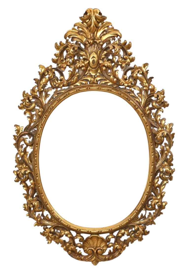 A BAROQUE STYLE GILTWOOD FRAME: A Baroque style giltwood oval frame20th centuryheight 51in (130cm); width 32in (81cm).Estimate $1200-1500