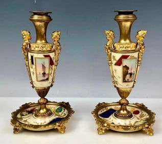 A PAIR OF ORMOLU MOUNTED PARIS PORCELAIN CANDEL HOLDERS