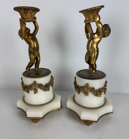 A PAIR OF ORMOLU MOUNTED MARBLE FIGURES