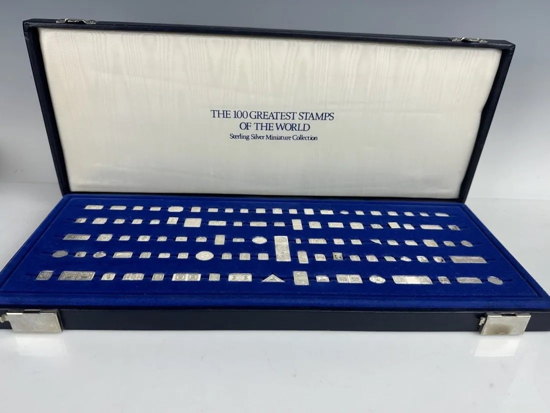 FRANKLIN MINT 100 GREATEST STAMPS OF THE WORLD: All sterling silver in original box. Estimate $800-1.000