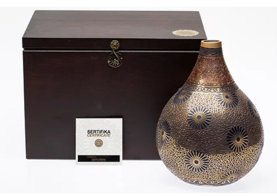 TURKISH KOZMIK YILDIZ GLASS VASE: Kozmik Yildiz, Turkish Glass Vase Pasabahce Magazalan, with raised gilt motifs on blue, gold and red ground, etched 'Pasabahce Magazalan, 2000/1033' on underside. In a wood box with certificate of aut