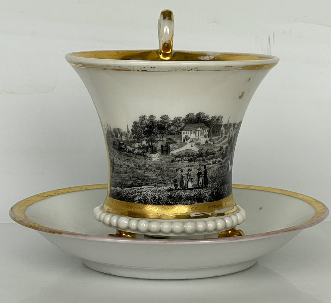 CONTINENTAL PORCELAIN CUP AND SAUCER: Circa 1900. In good condition. Estimate $500-600