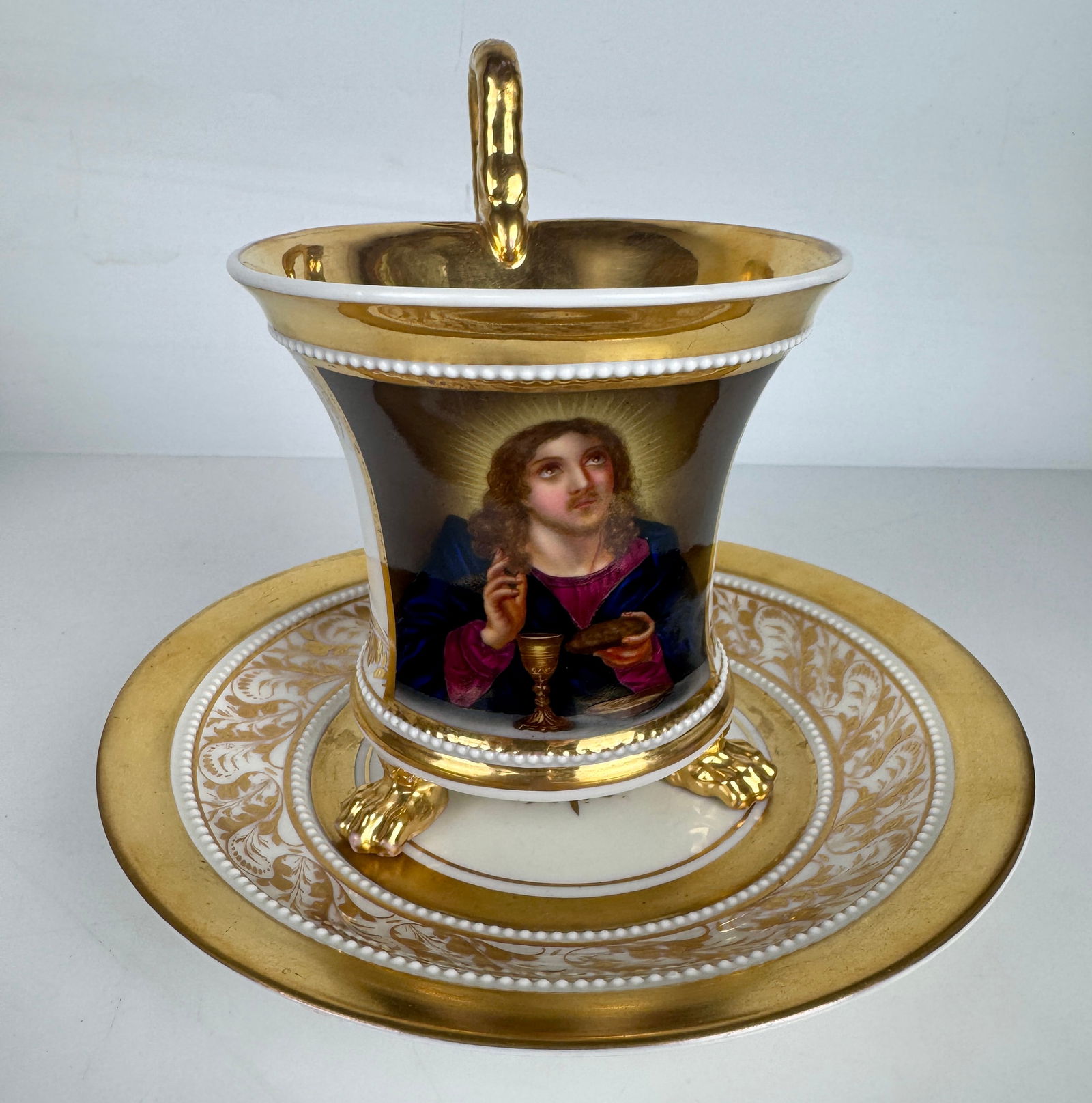 19TH C. BERLIN KPM CUP AND SAUCER: In excellent condition. Estimate $800-1000