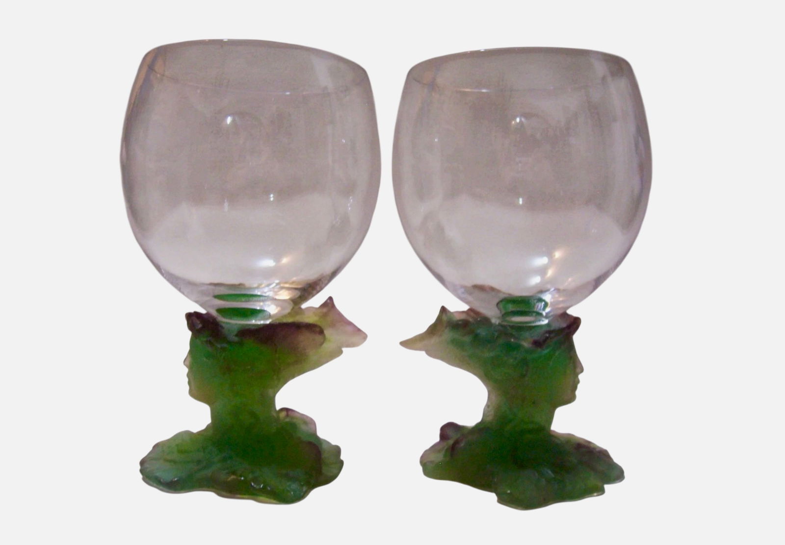 PAIR OF DAUM PATE DE VERRE BACCHUS BRANDY, COGNAC SNIFTERS: Signed Daum France. In excellent condition. Estimate $1000-1200