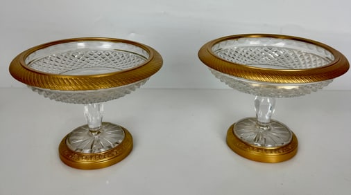 A PAIR OF ORMOLU MOUNTED BACCARAT CRYSTAL DISHES