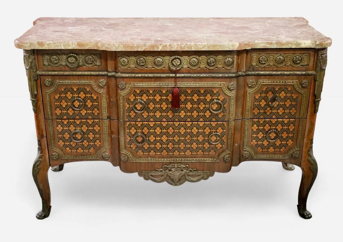 ORMOLU MOUNTED MARBLE TOP COMMODE: Circa 1920. Measures : 53" W x 22" D x 34" H. Estimate $2000-2500
