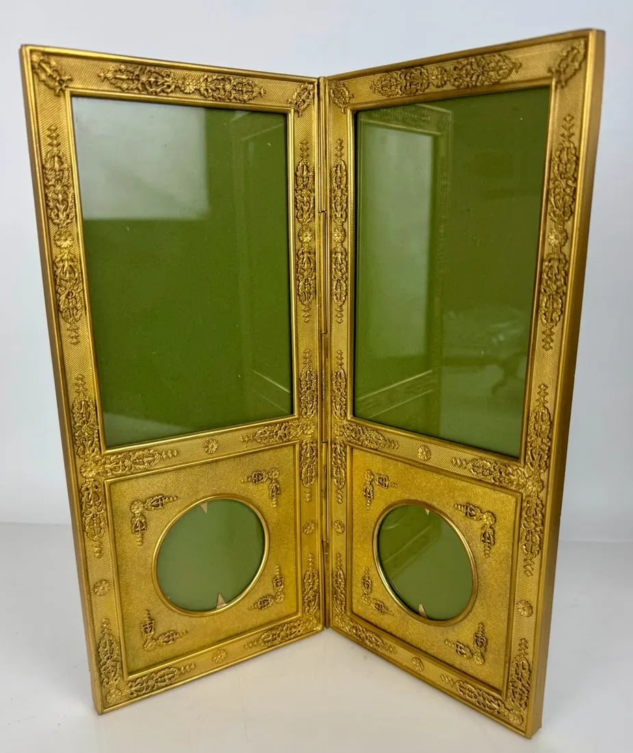 A LARGE EMPIRE DORE BRONZE PICTURE FRAME: Circa 1820. Measures 11 inches x 11 inches . In good condition. Estimate $1200-1500