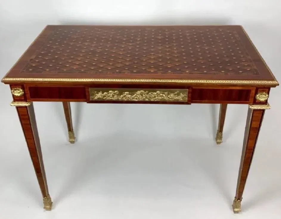 19TH CENTURY PARQUETRY TOP ORMOLU MOUNTED DESK: Measures 29.375"' H x 38.875" W x 22.125" D. Estimate $3000-4000