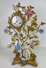 A LARGE ORMOLU MOUNTED MEISSEN CLOCK