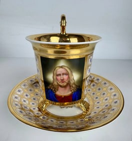 A MAGNIFICENT CONTINENTAL PORCELAIN CUP AND SAUCER