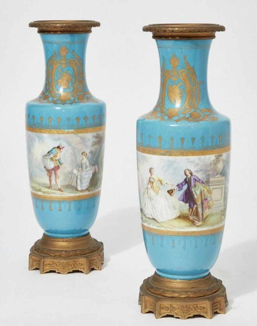PAIR OF ORMOLU MOUNTED SEVRES PORCELAIN VASES: Circa 1900. Measure 15 inches high. In good condition. Estimate $1.200-1.500
