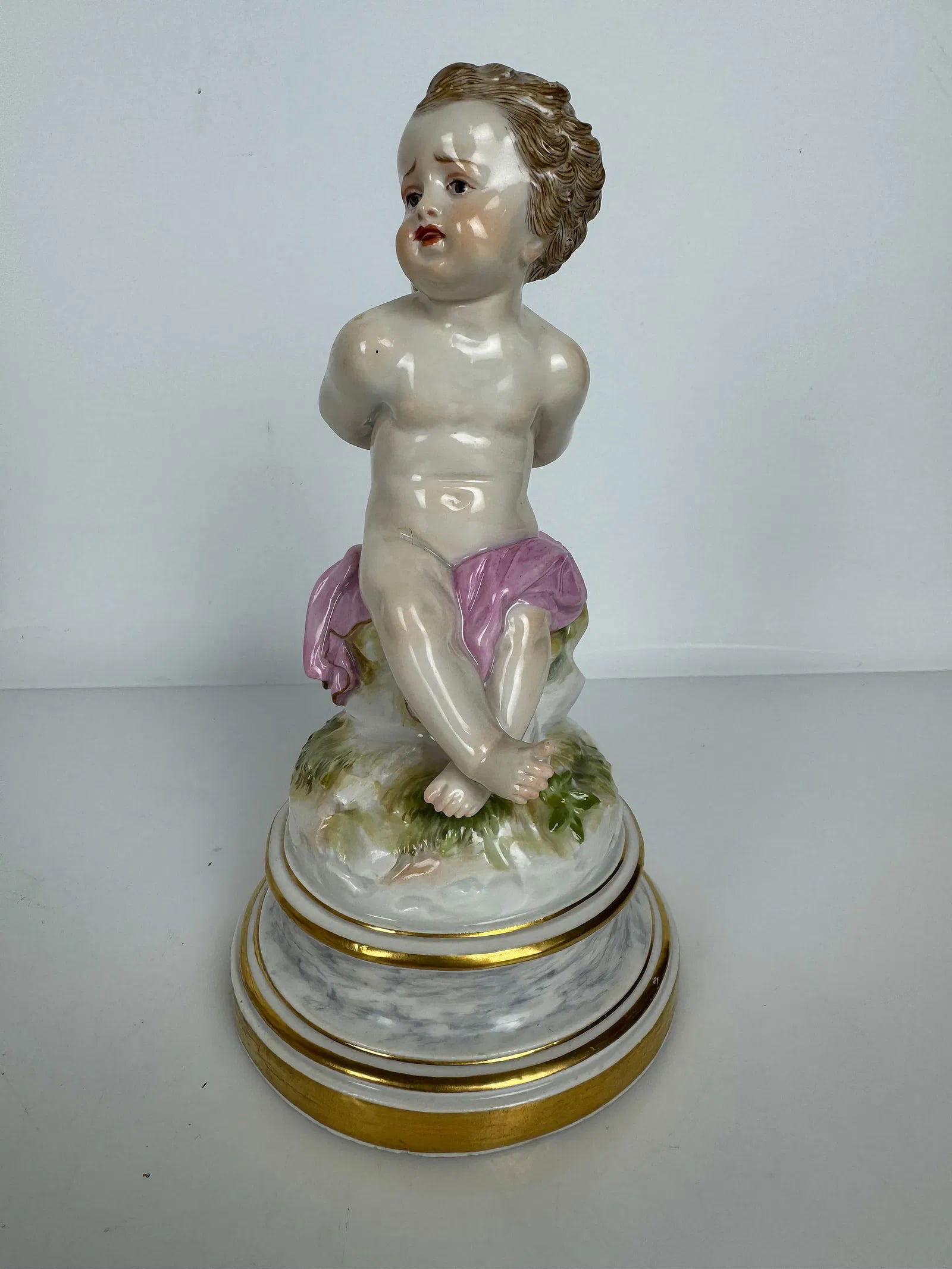 MEISSEN CHERUB L SERIES: Circa 1900. First quality mark. Measures 8 inches h. In excellent condition. Estimate $1000-1200