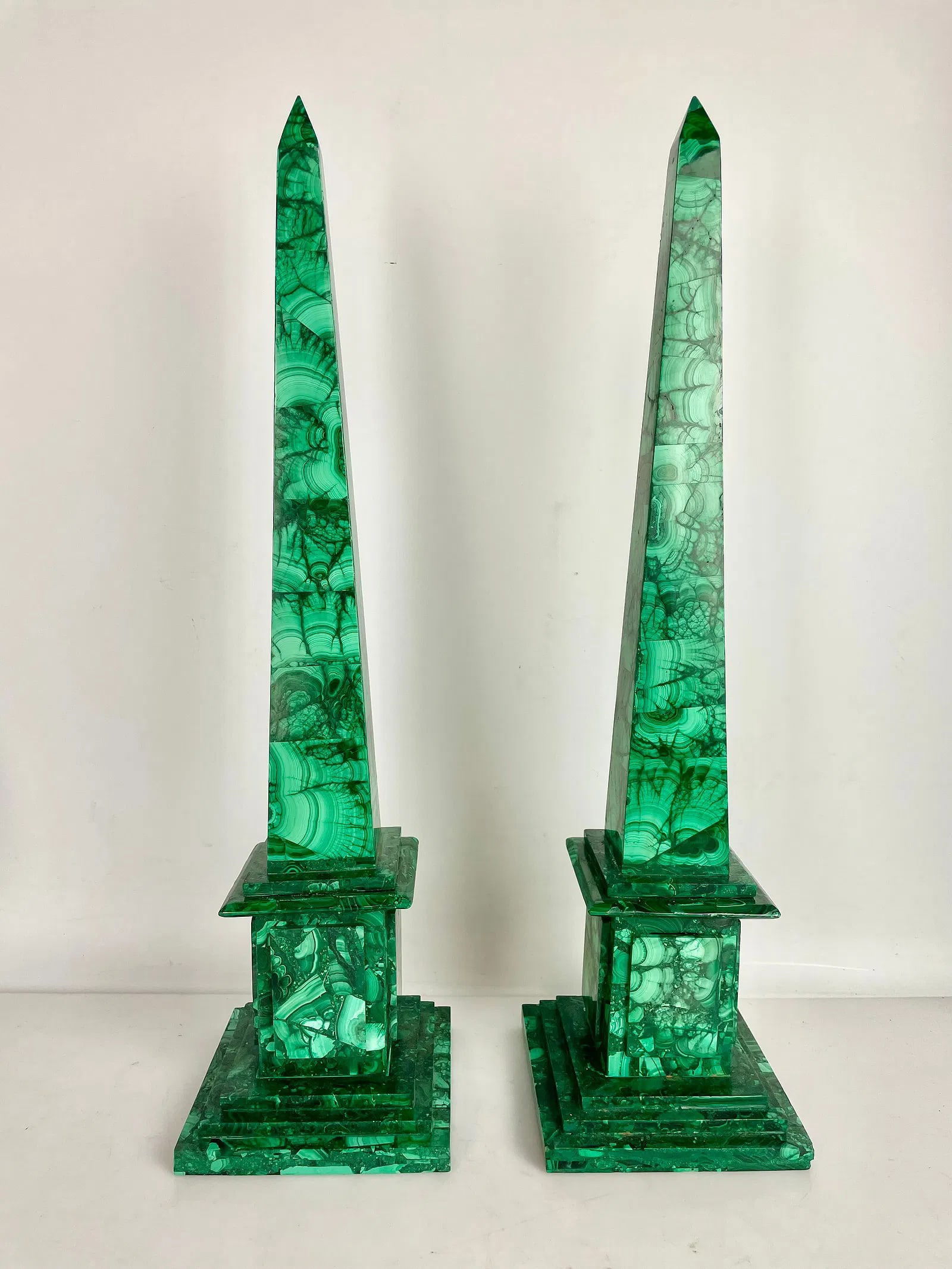 A PAIR OF MALACHITE OBLISQUES: Measure 20 inches high. In good condition. Estimate $1500-2000