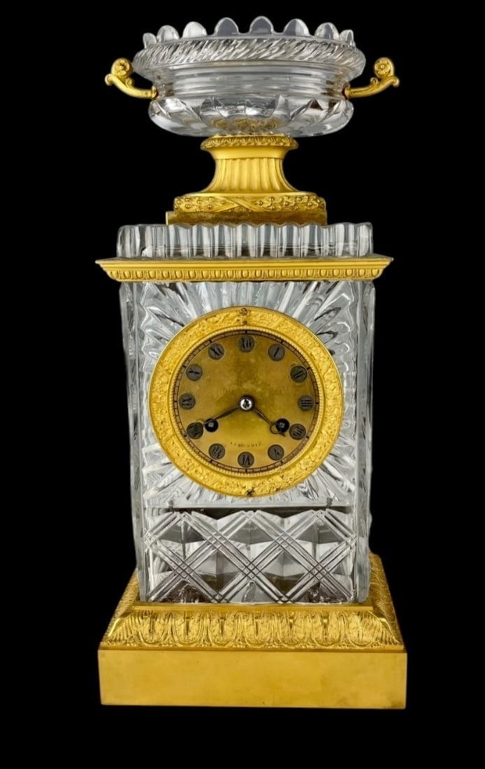 19TH C. ORMOLU MOUNTED BACCARAT CRYSTAL CLOCK: Measures 12 inches high. In overall good condition. No breaks, no cracks. Estimate $2500-3000