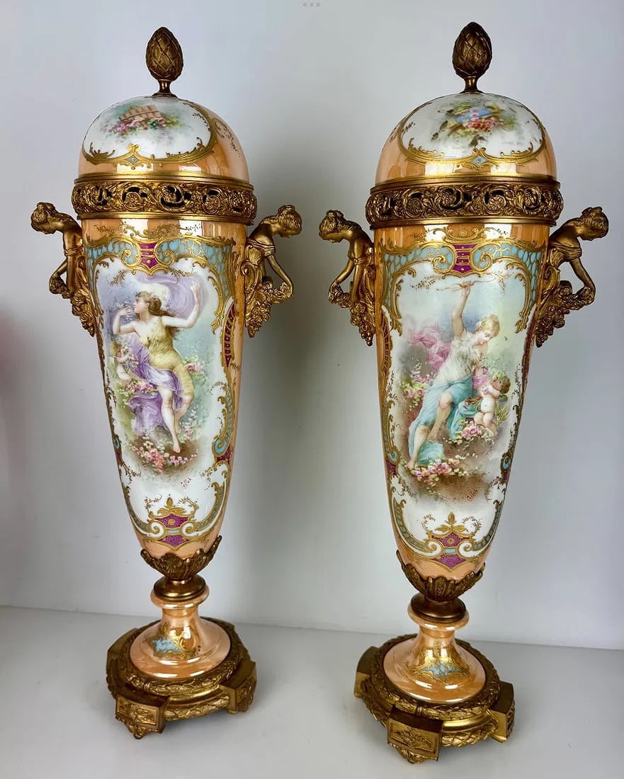 A LARGE PAIR OF ART NOUVEAU ORMOLU MOUNTED SEVRES PORCELAIN VASES: Circa 1920. Ormolu mounted. Signed Collot. Measure 20 inches high. In perfect condition. Estimate $6000-8000