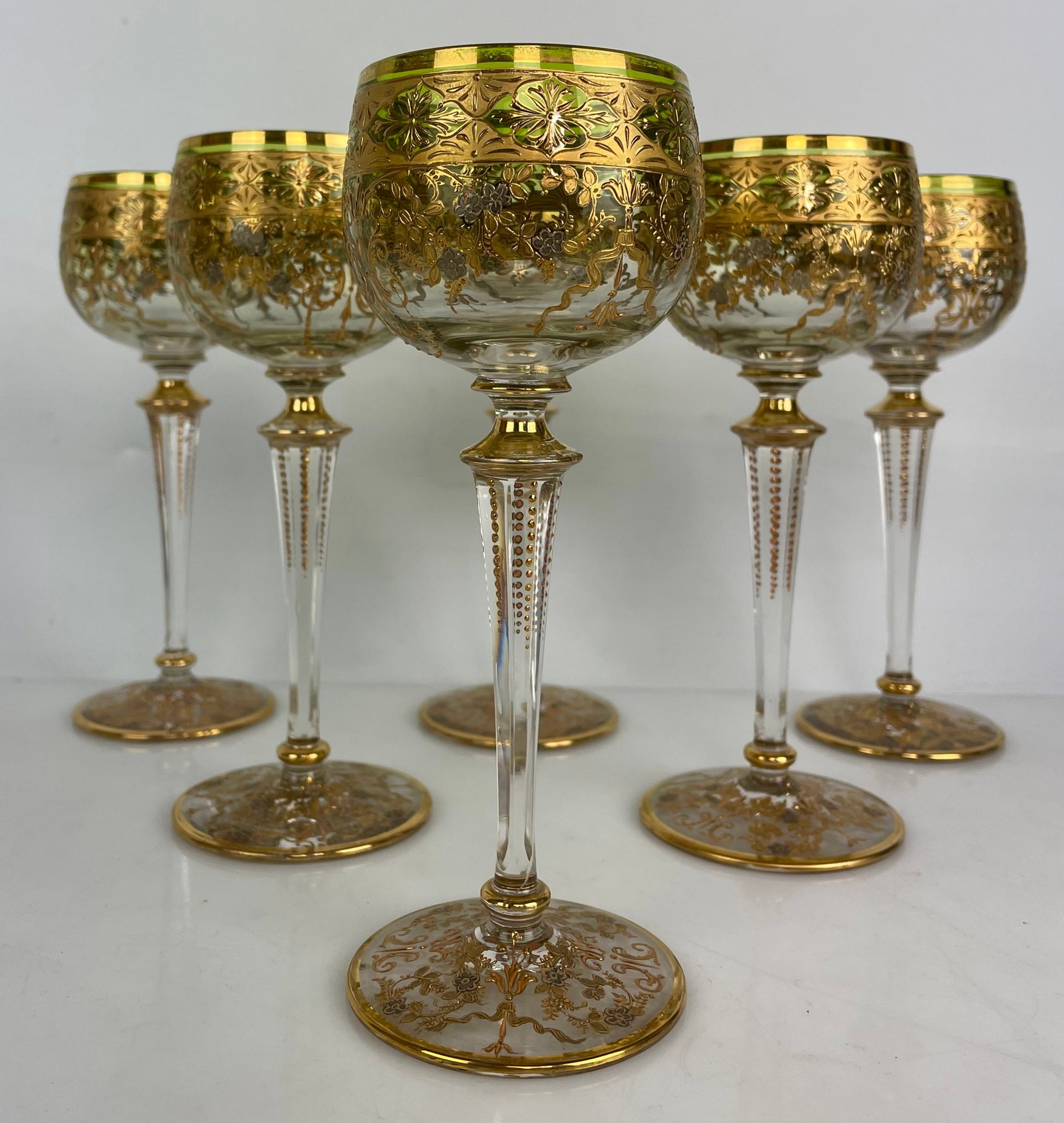 A MAGNIFICENT SET OF 6 ENAMELLED MOSER WINE GLASSES: Circa 1900. Measure 7.;25” tall. In very good condition. Estimate $1200-1500