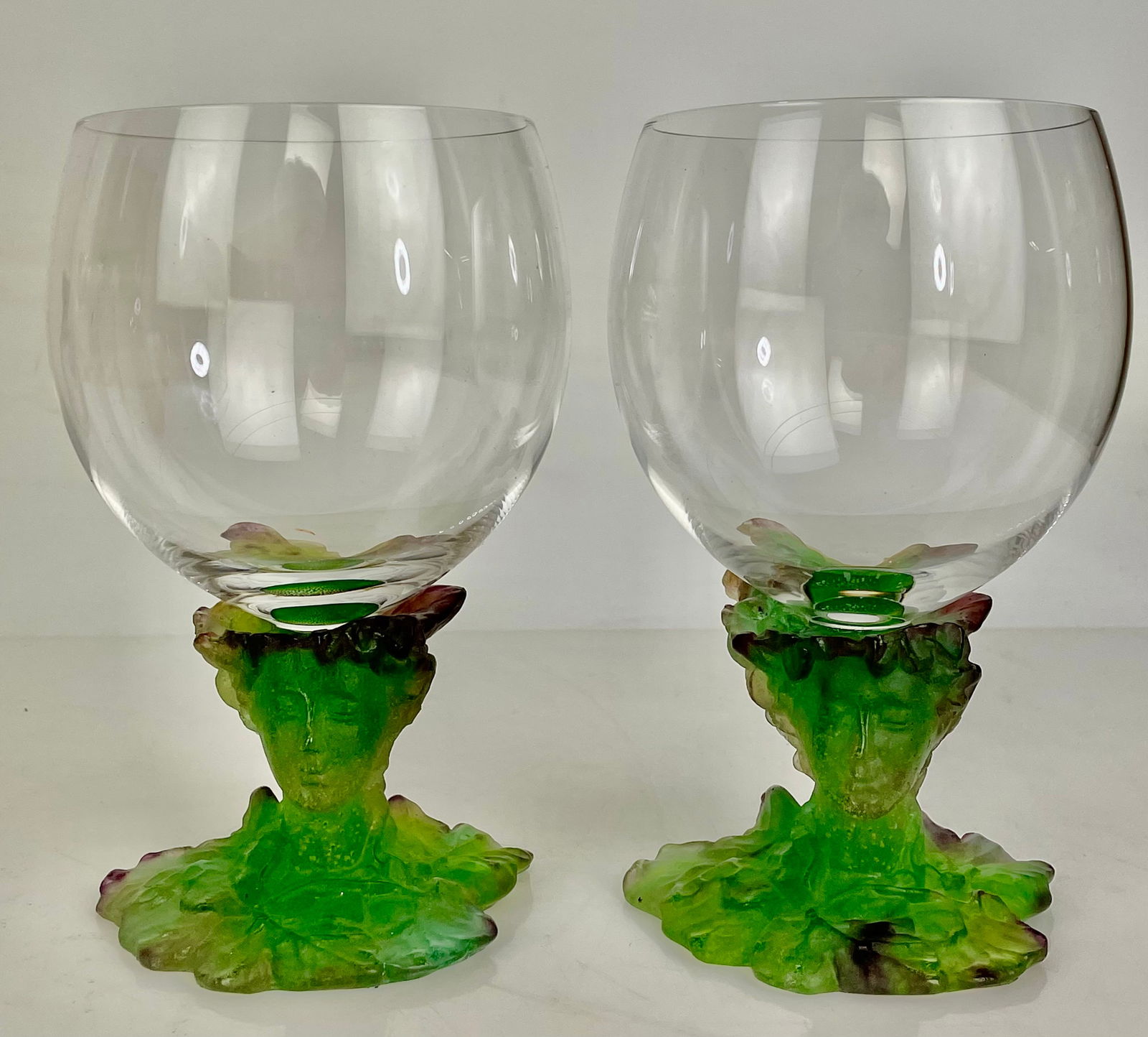A PAIR OF DAUM PATE DE VERRE CONGAC SNIFTERS: Signed Daum France. Measures 6.5” h. In excellent condition. Estimate $1000-1200