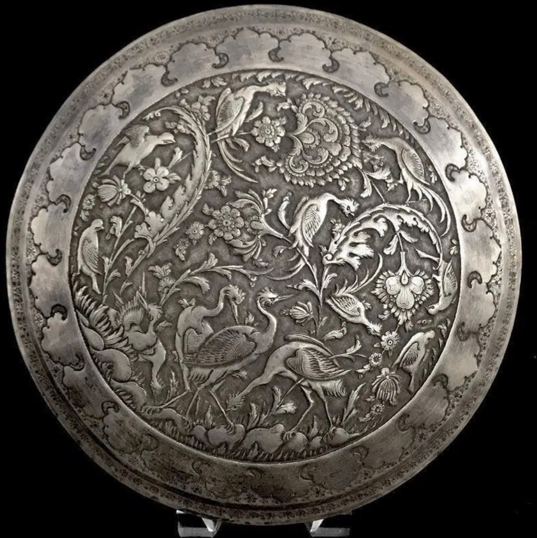 A VERY FINE MID CENTURY PERSIAN SILVER BOX: Marked 84 , and makers name. Measures 10 inches diameter , and weighs 999 grams. Good condition.Estimate $3000-3500