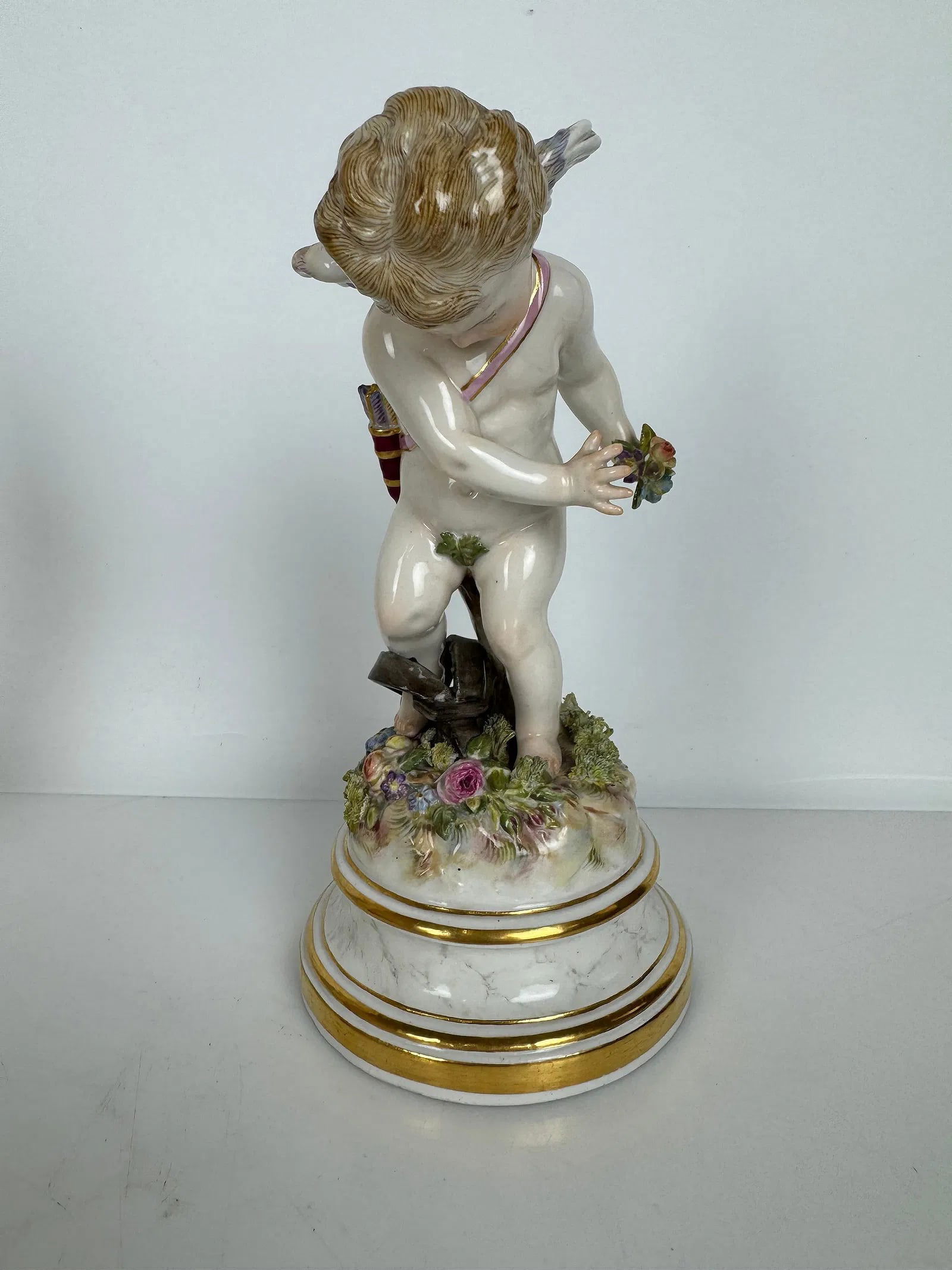 MEISSEN CHERUB L SERIES: Circa 1900. First quality mark. Measures 8 inches h. In excellent condition. Estimate $1000-1200