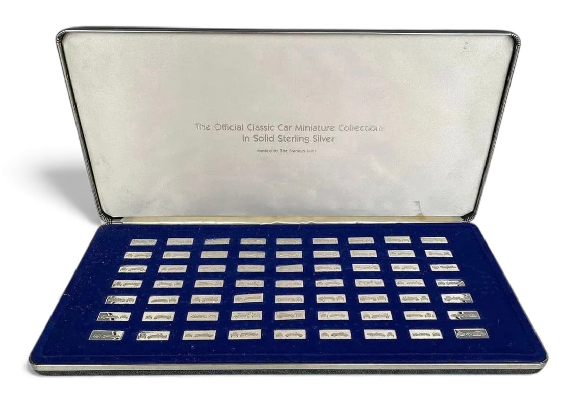 FRANKLIN MINT STERLING CLASSIC CARS IGNOTS: 63 sterling silver ignots , in original gift box. Estimate $800-1.000