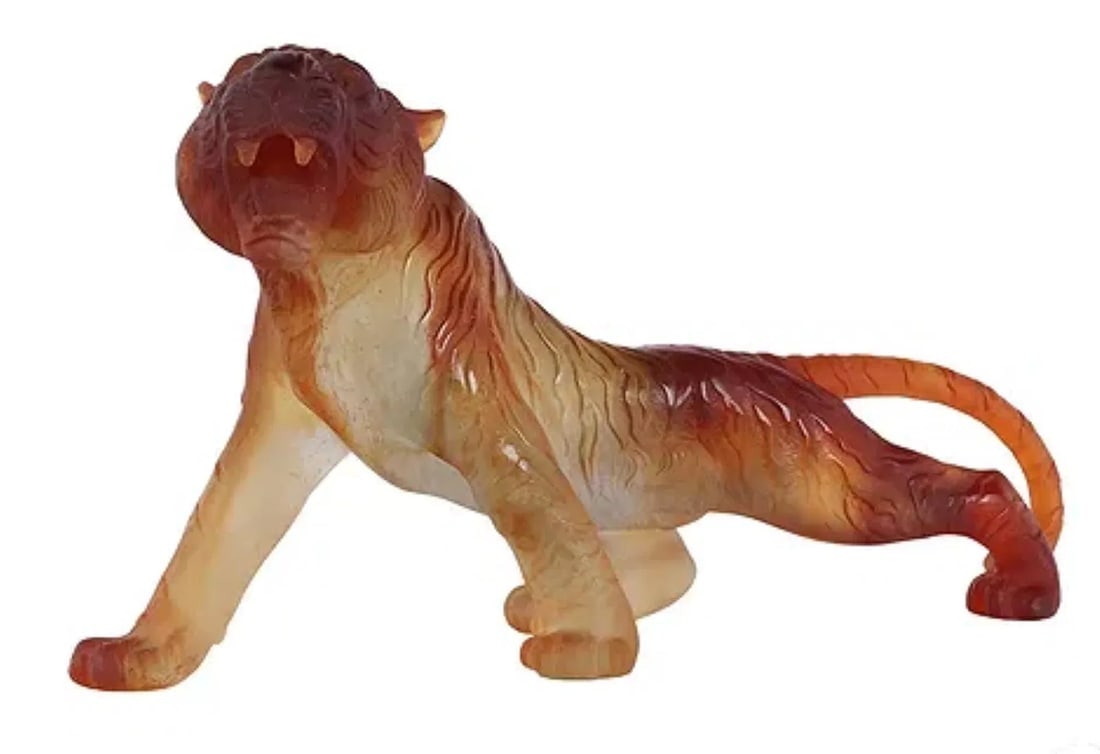 DAUM PATE DE VERRE ROARING TIGER: Daum France pate de verre art glass sculpture of a roaring tiger in a dynamic pose, crafted in rich amber, honey, and russet hues. Signed and numbered "Daum France" along the side of rear leg.Dimensio