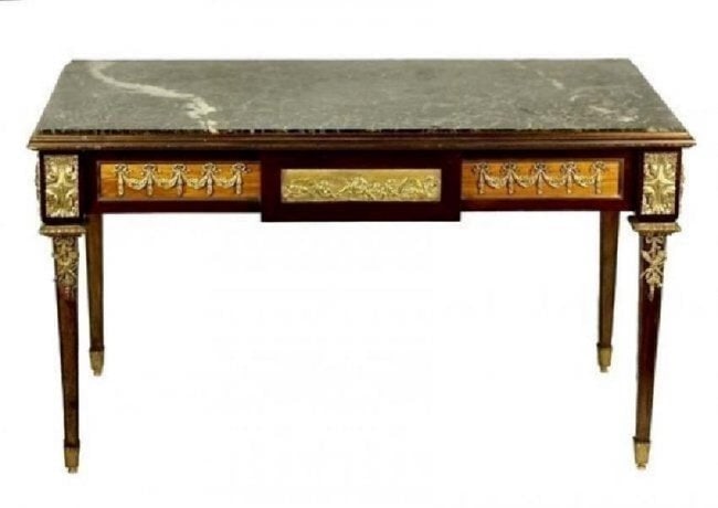 19TH C. ORMOLU MOUNTED MARBLE TOP COFFEE TABLE: Measures 22.25'' H x 39.25'' W x 22.6'' D. Excellent condition. Estimate $4.000-5.000