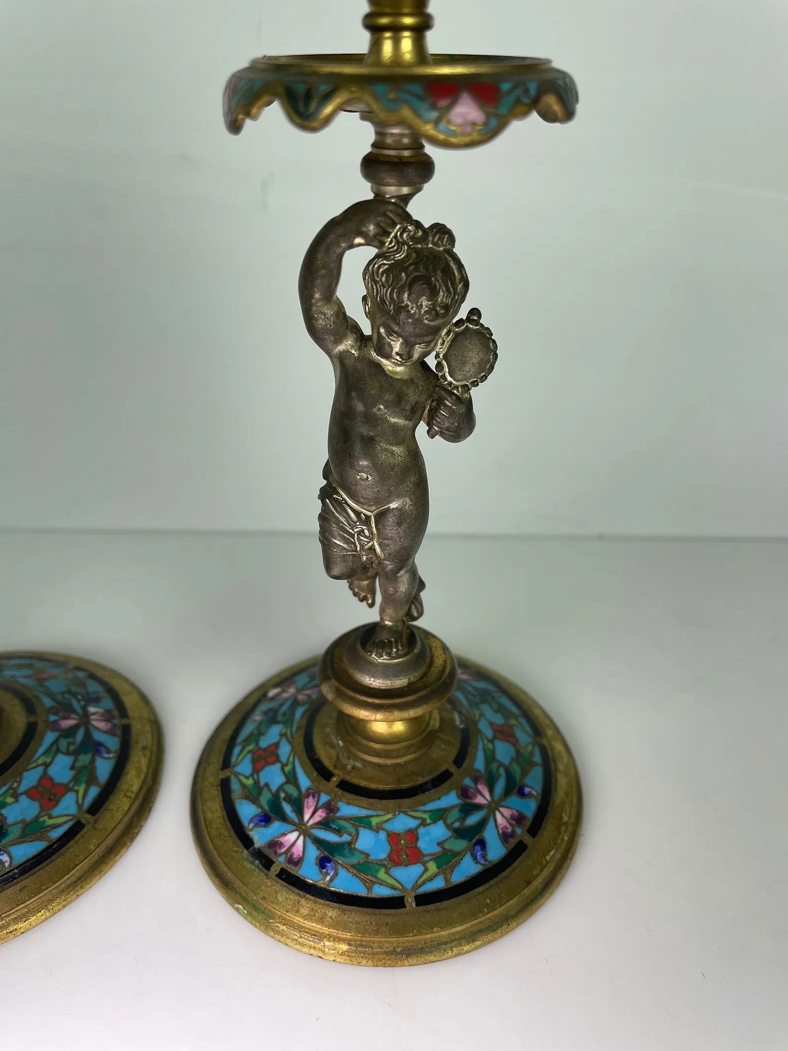 A PAIR OF 19TH C. FRENCH CHAMPLEVE ENAMEL CANDEL HOLDERS: Measure 7.5 inches h. Estimate $600-800