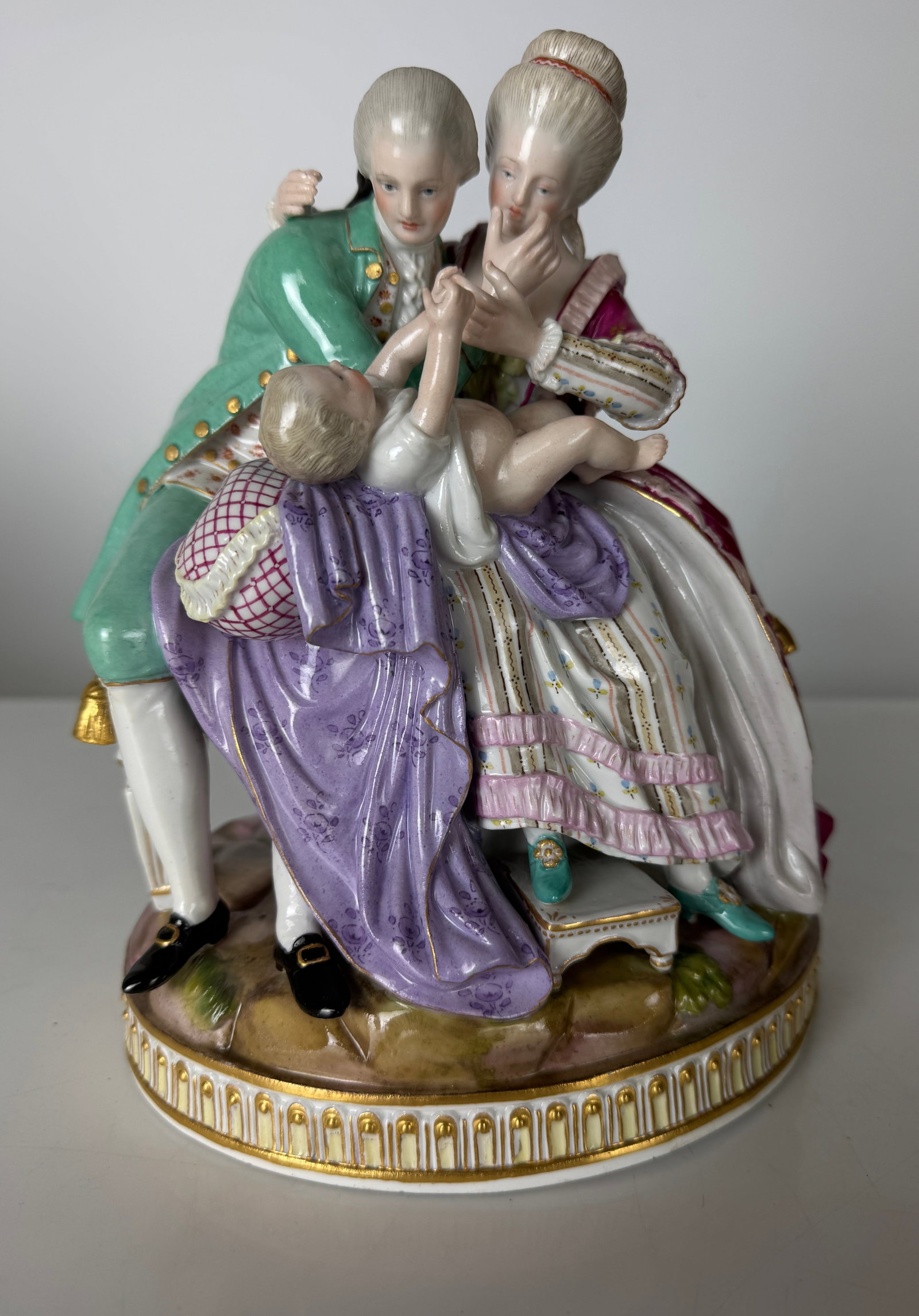 RARE MEISSEN GROUP DEPICTING THE GOOD PARENTS E81: Circa 1850 , The Lucky Parents Model E 81 The Happy Parents by Michel Victor Acier,Measures 9.8” high, 8” w. First quality , in excellent condition. Estimate $4000-5000