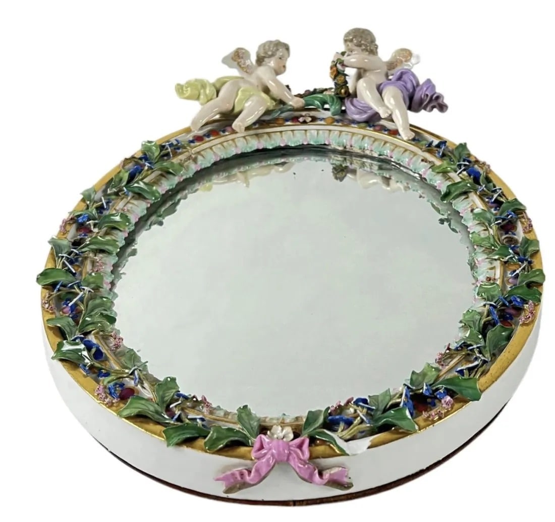 19TH C. FLOWER INCRUSTED MEISSEN MIRROR: Measures 13.5 inches tall. Chips to flowers. Estimate $1.000-1.500