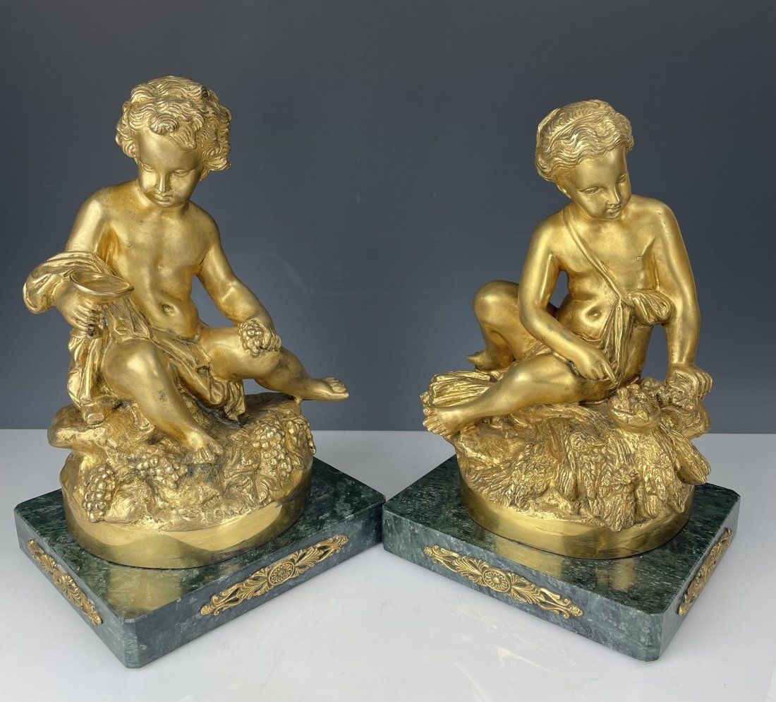 A PAIR OF DORE BRONZE SCULPTURES SIGNED R. MOREAU: Circa 1900. Measures 12 inches high. Estimate $3.000-4.000