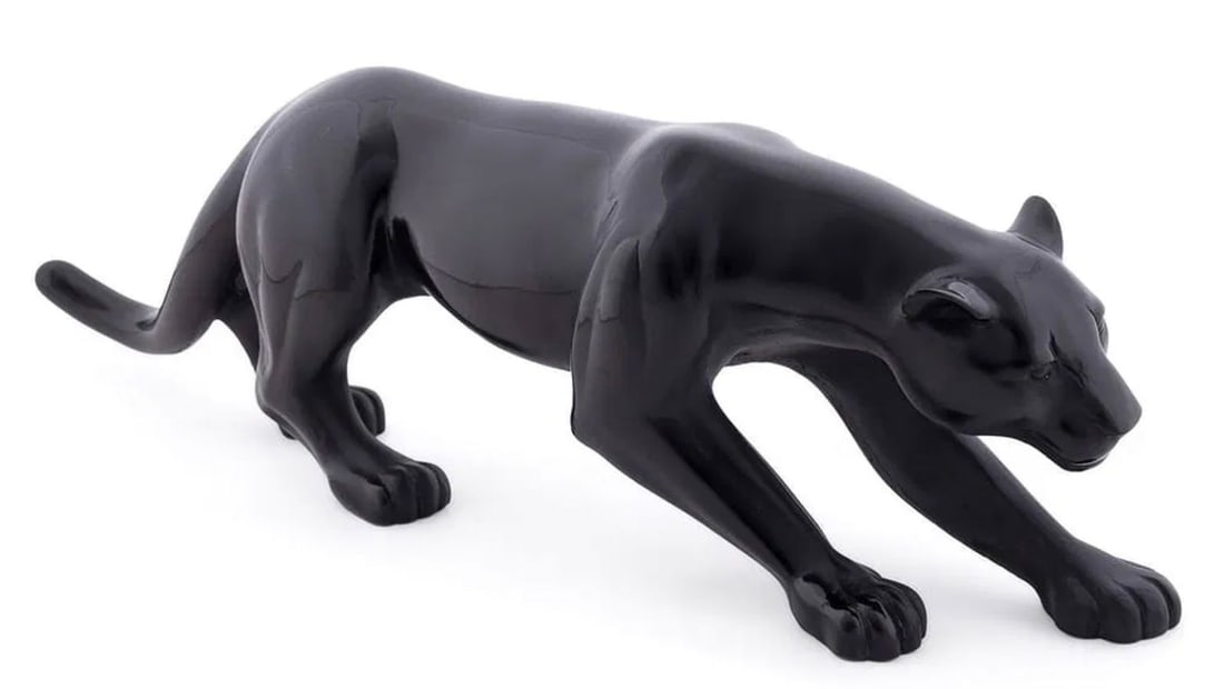 DAUM 'LA PANTHERE NOIRE' SCULPTURE, 2/1000: Daum (French, founded 1878), contemporary. Limited edition black "La Panthere Noire" pate de verre panther sculpture, appropriately marked Daum France.Approximate dimensions: h. 5", w. 16.25", d. 3.5"