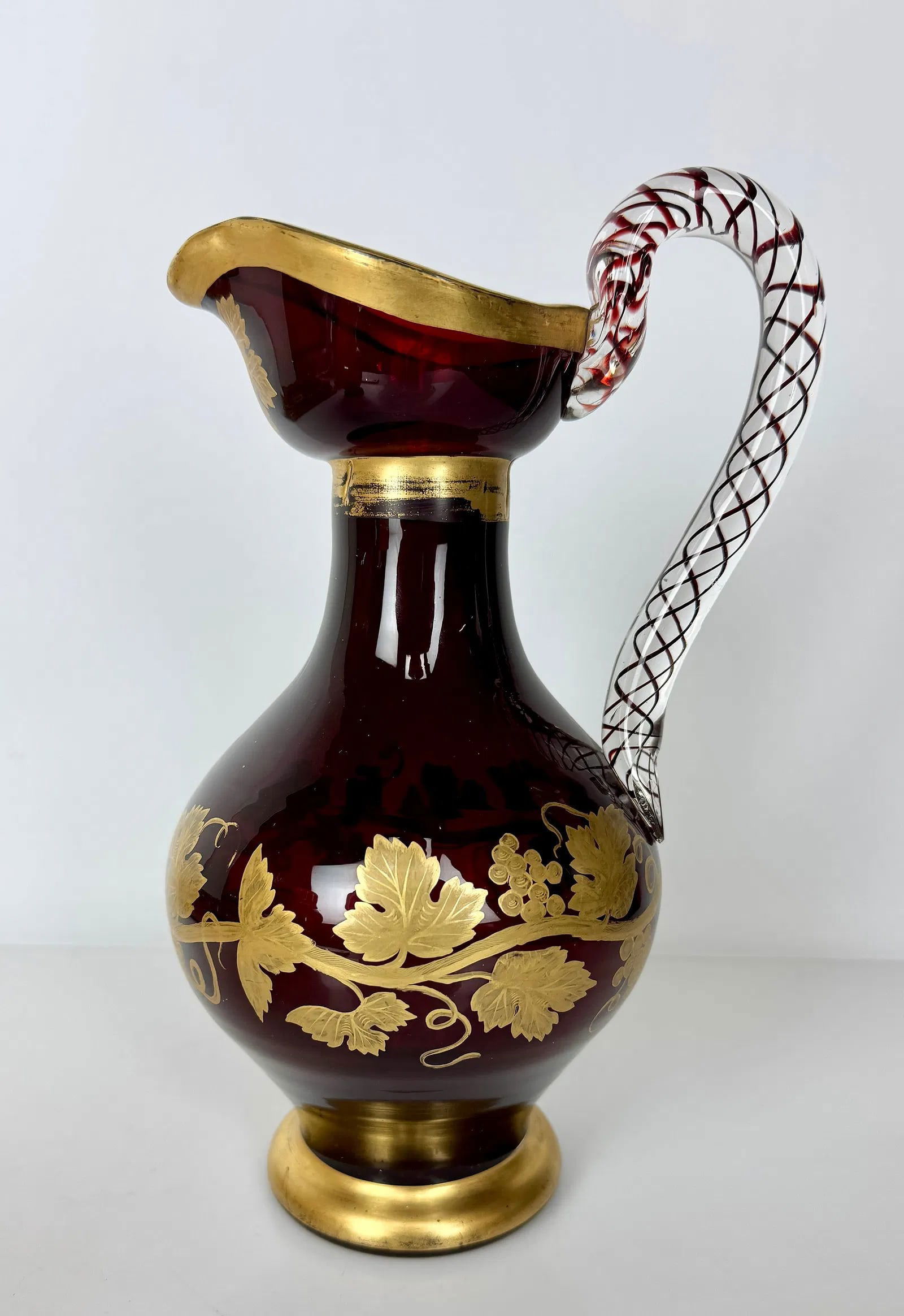 GILT MOSER PITCHER: Circa 1900. Measures 10.5 inches tall. In perfect condition, minor loss of gold. Estimate $1000-1200