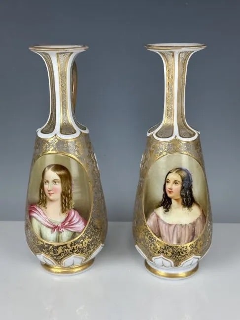 A PAIR OF 19TH C. BOHEMIAN OVERLAY GLASS BOTTLES: Measure 9 inches h. In good antique condition, minor loss of gold. Estimate $1.500-2.000