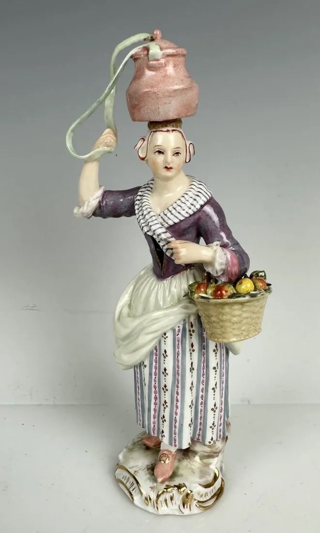 19TH C. MEISSEN FIGURE: First quality cross swords mark. Measures 6 inches tall. In good antique condition. Estimate $700-800