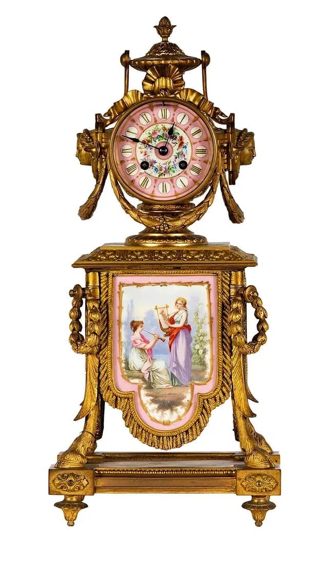 19TH C. ORMOLU MOUNTED SEVRES PORCELAIN CLOCK: Measures 19.5 inches high. No damage detected. Estimate $1200-1500