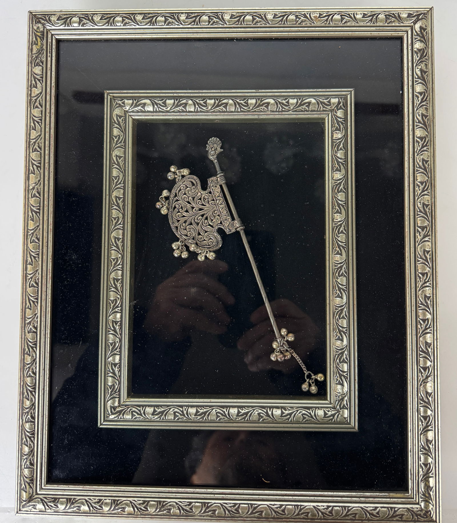 INDIAN SILVER TEMPLE FAN RATTLE FRAMED: Antique Pankhi temple fan rattle in high quality silver framed. Estimate $600-800