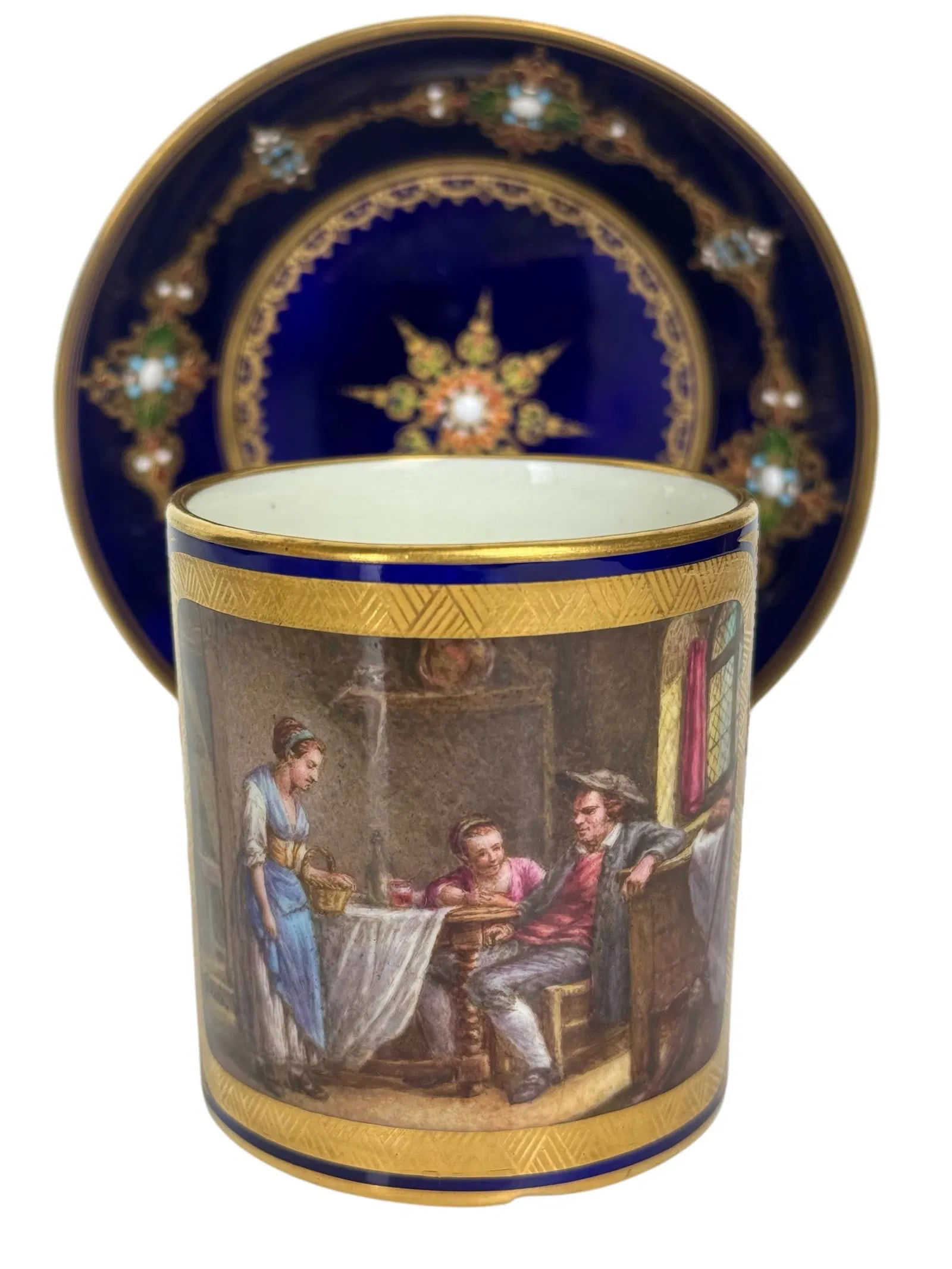 A MAGNIFICENT JEWELLED SEVRES CUP AND SAUCER: Circa 1800. In excellent condition, Estimate $2500-3000