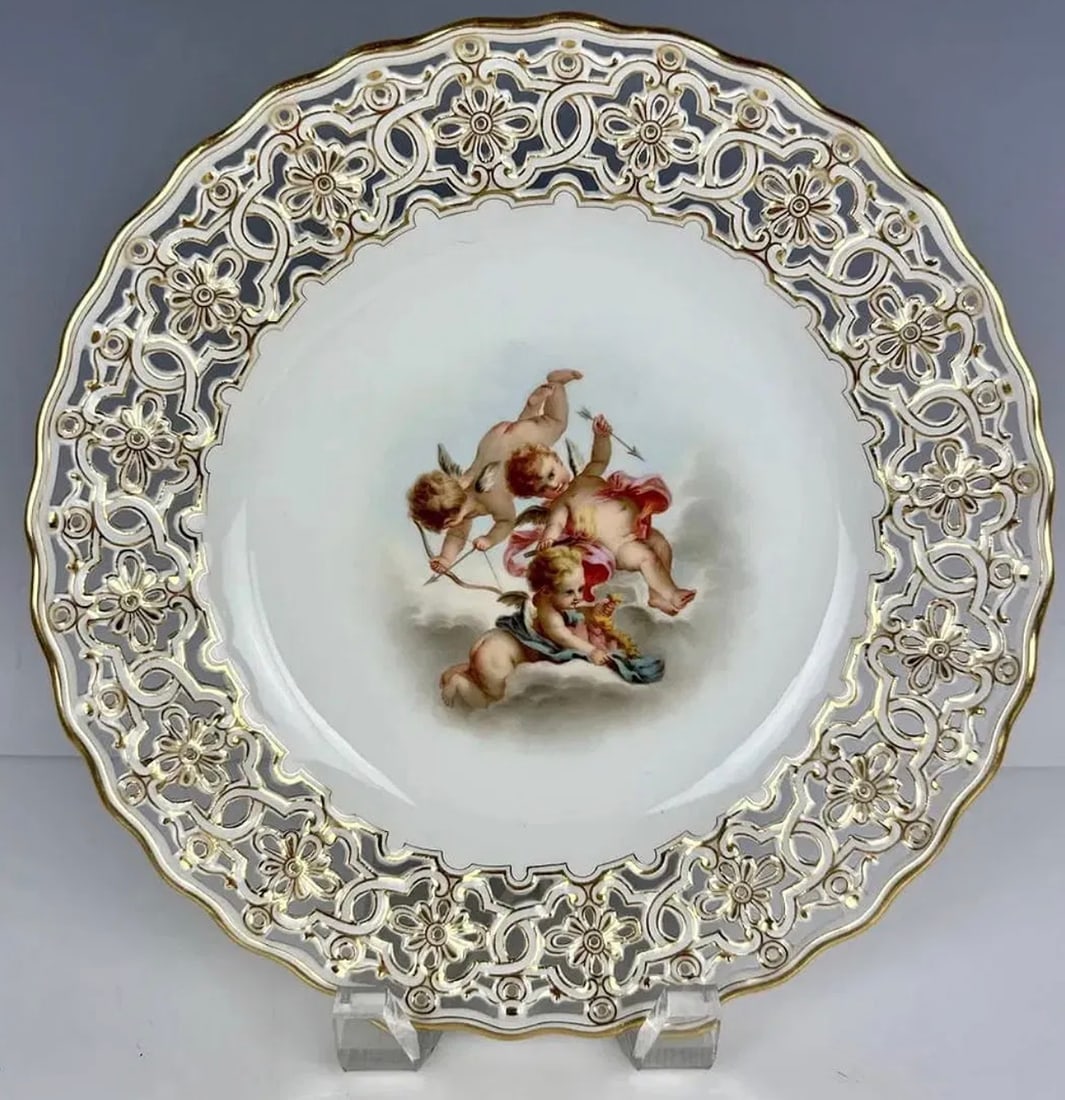 19TH C. MEISSEN RETICULATED PLATE: First quality cross swords mark. Measures 9.5 inches d. Estimate $2.000-2.500