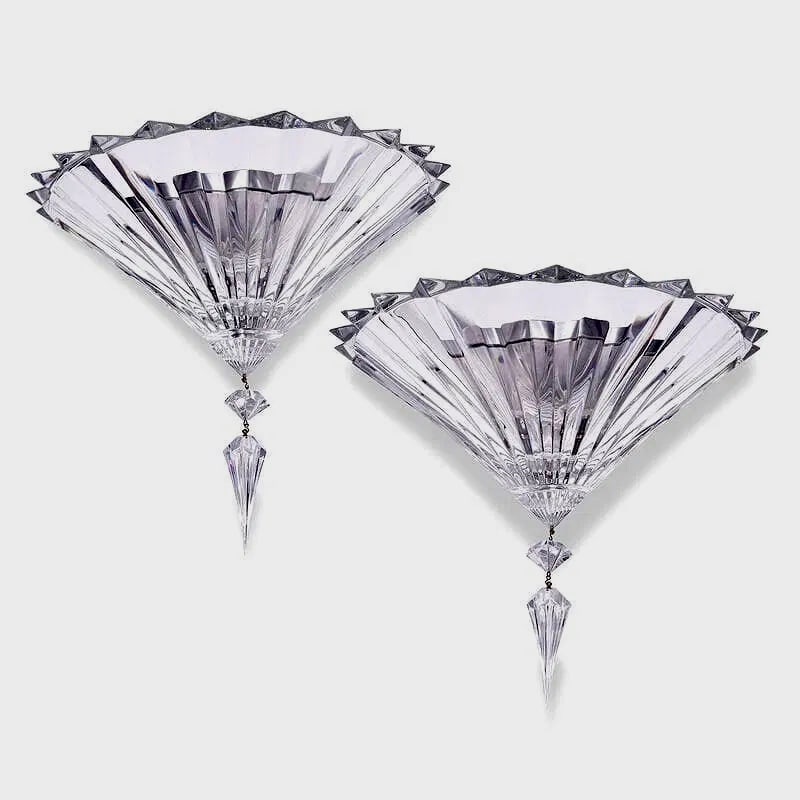 A PAIR OF BACCARAT MILLE NUIT WALL SCONSES: Stamped Baccarat. Measures 16” x 16’ h. In good condition. Estimate $6000-8000