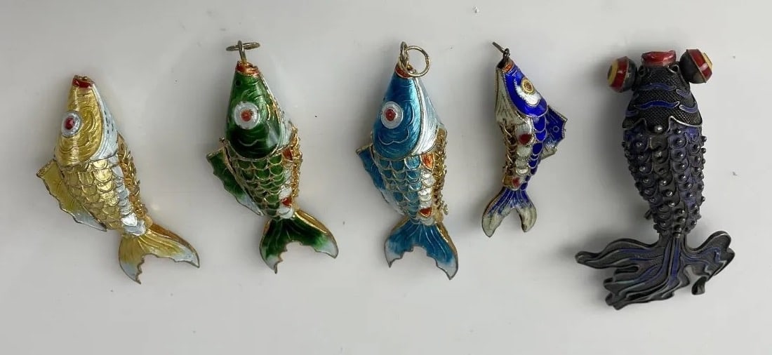 SET OF 5 CHINESE STERLING AND ENAMEL FISH: E largest 5 inches. Estimate $300-400