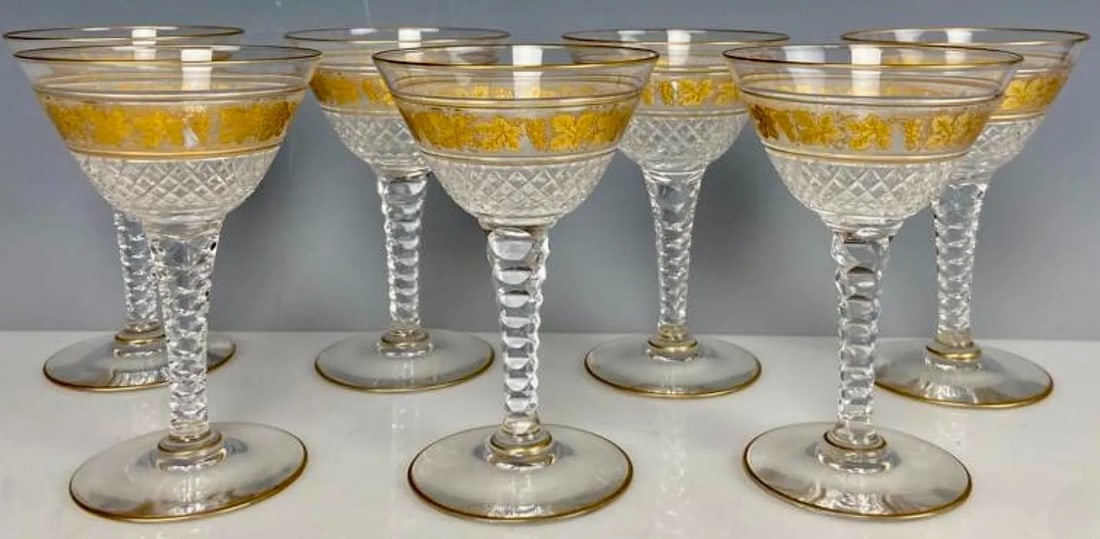 SET OF 7 GILT VINE GLASSES: Measure 7 inches h. In good condition. Estimate $700-800