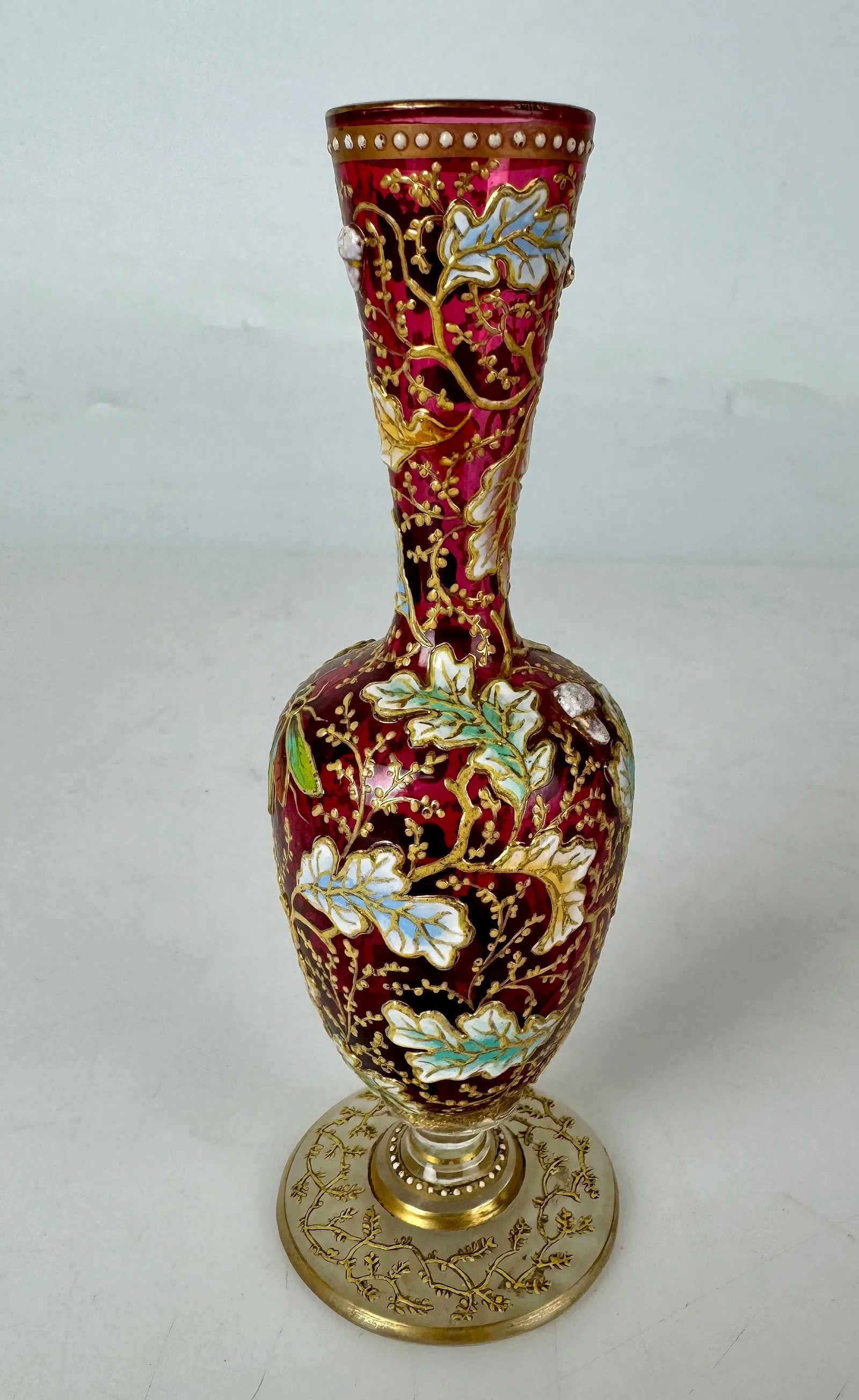 ENAMELLED AND GILT MOSER VASE: Circa 1900. Measures 5 inches high. In very good condition. Estimate $400-500