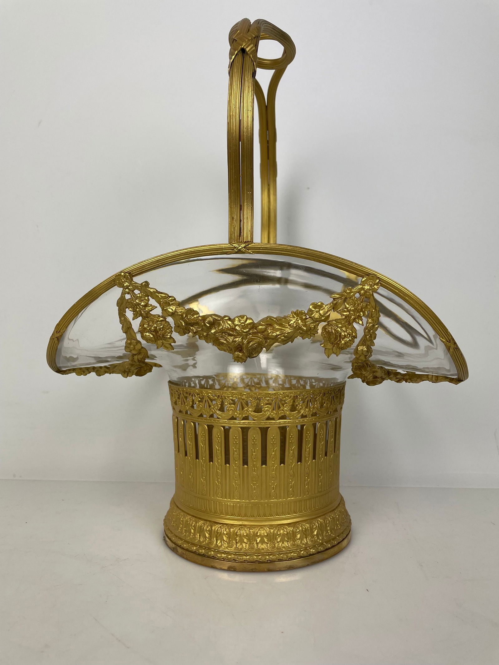 A LARGE ORMOLU MOUNTED BACCART CTYSTAL BASKET: Circa 1900. Measures 13 inches . In good condition. Estimate $1200-1500