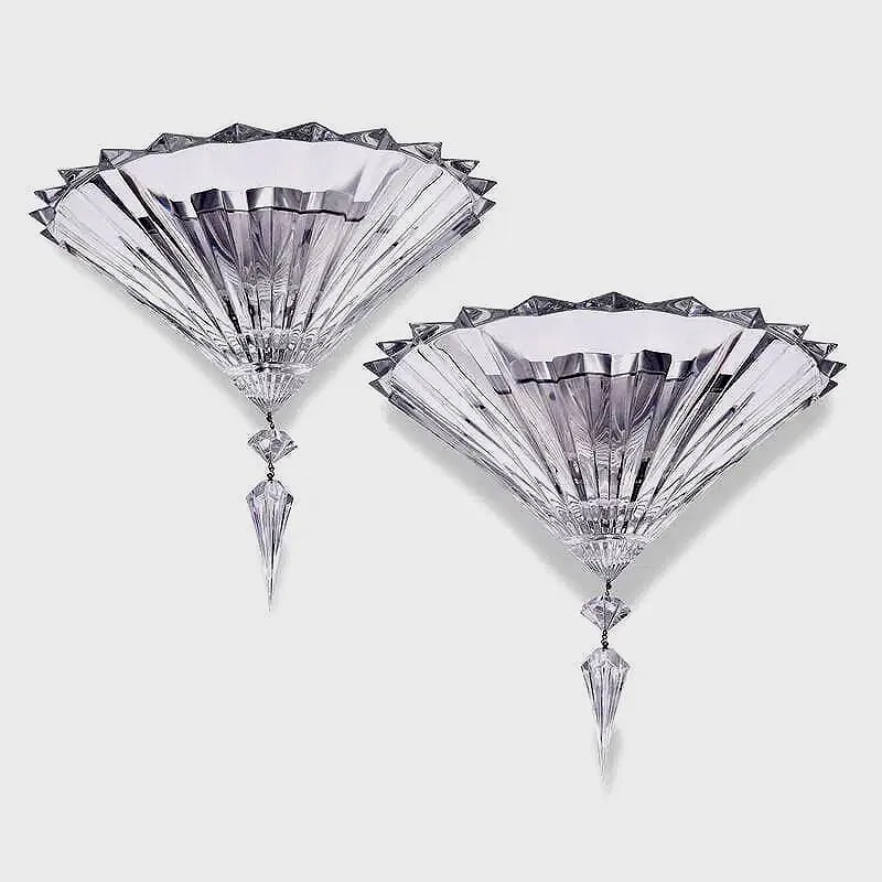 A PAIR OF BACCARAT MILLE NUIT WALL SCONSES: Stamped Baccarat. Measures 16 inches x 16’ h. In good condition. Estimate $6000-8000